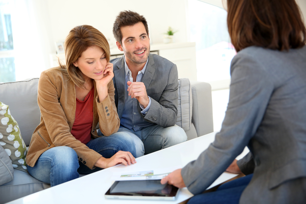 couple consulting with a financial advisor