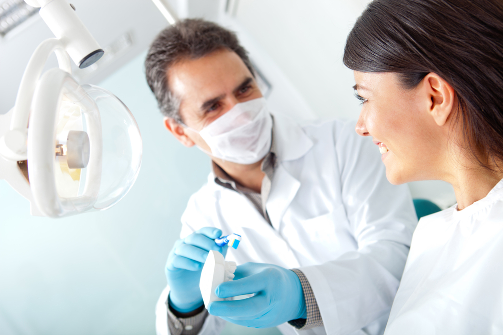 dentist talking to a patient