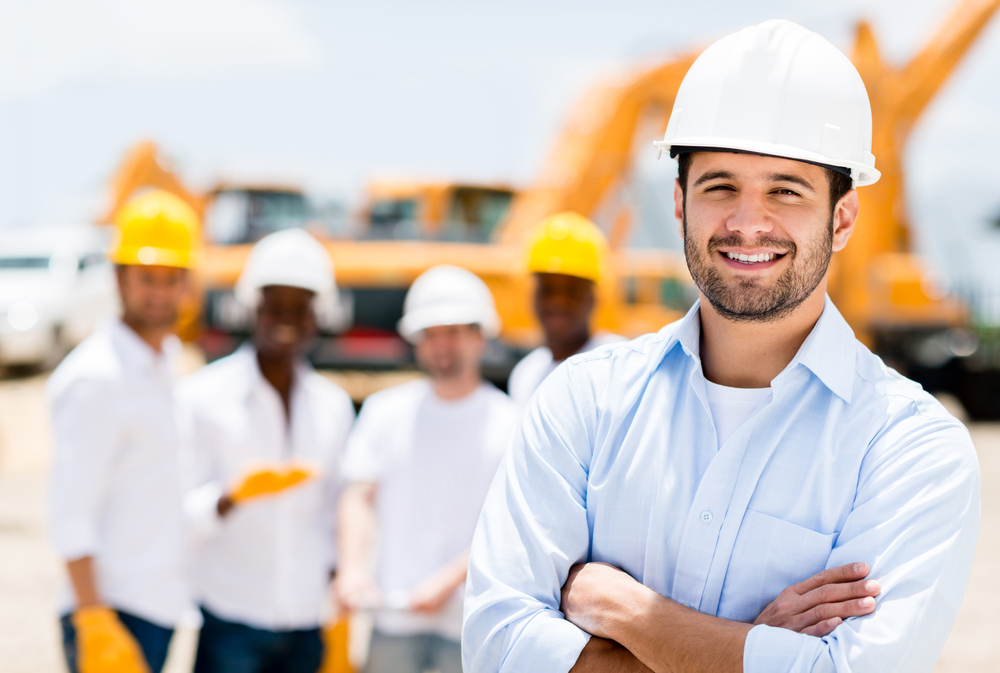 contractor smiling on a building site
